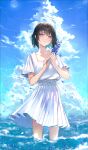  1girl absurdres bangs black_hair clouds dress flower grey_eyes hands_up highres holding holding_flower lacy_(beees002) looking_at_viewer original parted_lips short_hair short_sleeves sky solo standing wading water white_dress wind 