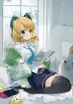  1girl bangs blonde_hair blue_archive bow cat_ear_headphones couch eru_daydream green_eyes hair_bow headphones highres indoors jacket midori_(blue_archive) navel necktie nintendo_switch on_couch peroro_(blue_archive) pillow pout shirt short_hair shorts thigh-highs twitter_username white_shirt window 