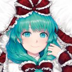  1girl bangs bow commentary_request dress eyelashes face frilled_bow frilled_dress frills green_eyes green_hair hair_bow kageharu kagiyama_hina lips long_hair looking_at_viewer lying on_bed red_bow smile solo touhou 
