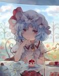  1girl absurdres bat_wings blue_hair blue_sky brooch cake clouds cup day flower food frilled_shirt_collar frills fruit glint hat hat_ribbon highres holding jewelry kozumi_(tokuni_naitteba) looking_at_viewer mob_cap plate puffy_short_sleeves puffy_sleeves red_eyes red_ribbon remilia_scarlet ribbon short_hair short_sleeves sky solo strawberry table teacup tiered_tray touhou upper_body wings wrist_cuffs 