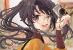  1girl absurdres black_hair blurry blurry_background camera floating_hair highres holding holding_camera idolmaster idolmaster_shiny_colors looking_at_viewer looking_to_the_side mitsumine_yuika nail outdoors round_eyewear smile solo tanupon twintails upper_body 