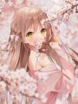  1girl bangs bare_shoulders blurry blurry_background blurry_foreground blush bow brown_hair cherry_blossoms covering_mouth depth_of_field eyebrows_visible_through_hair flower from_side green_eyes hair_between_eyes hair_bow hair_ribbon hand_up highres long_hair long_sleeves looking_at_viewer looking_to_the_side off-shoulder_sweater off_shoulder original pink_sweater ribbon solo sweater upper_body weri white_bow white_flower 