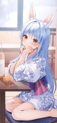  1girl :d animal_ears barefoot blue_hair blurry blurry_background bottle commentary_request cup extra_ears grin hair_down highres hikimayu holding hololive indoors japanese_clothes kimono long_hair looking_at_viewer orange_eyes pink_sash rabbit-shaped_pupils rabbit_ears rabbit_girl rabbit_tail sash short_eyebrows sitting smile solo symbol-shaped_pupils tail thick_eyebrows tyabesu usada_pekora virtual_youtuber white_kimono yukata 