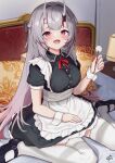  1girl :d alternate_costume apron bed black_footwear blush braid commentary_request commission enmaided french_braid gradient_hair grey_hair highres hitachi_sou hololive horns indoors long_hair looking_at_viewer maid mimikaki multicolored_hair nakiri_ayame neck_ribbon on_bed pillow red_eyes redhead ribbon sitting skeb_commission smile solo streaked_hair thigh-highs waist_apron wariza white_legwear wrist_cuffs 