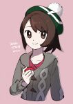  1girl absurdres bob_cut brown_eyes brown_hair buttons cable_knit cardigan closed_mouth collarbone collared_dress commentary dated dress gloria_(pokemon) green_headwear grey_cardigan hat highres holding holding_poke_ball hooded_cardigan looking_at_viewer mugiccha2 pink_background pink_dress poke_ball poke_ball_(basic) pokemon pokemon_(game) pokemon_swsh short_hair signature smile solo tam_o&#039;_shanter upper_body 