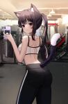  1girl :3 absurdres animal_ear_fluff animal_ears arched_back ass back back_cutout bare_arms bare_shoulders black_eyes black_hair black_pants breasts cat_cutout cat_ears cat_girl cat_tail clothing_cutout cowboy_shot crop_top from_behind gym highres long_hair looking_at_viewer looking_back medium_breasts midriff nannung original pants pantylines ponytail sleeveless smile solo spaghetti_strap sports_bra standing tail tail_raised yoga_pants 