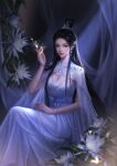  1girl absurdres black_hair curtains dark_background dress feng_wu_huai_hua_2020 flower hair_bun hair_ornament hand_on_lap hand_up highres light lu_xueqi_(zhu_xian) sitting solo white_dress zhu_xian 