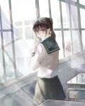  1girl black_hair black_skirt brown_eyes curtains desk flower highres holding holding_flower indoors long_sleeves original ponytail sakura_inu_(itoyatomo) school_desk school_uniform serafuku shirt skirt standing sunlight white_shirt wind window 