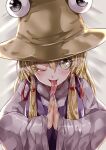  1girl absurdres blonde_hair brown_headwear commentary_request hair_between_eyes hair_ribbon hat highres large_hat long_hair long_sleeves long_tongue looking_at_viewer maboroshi_mochi moriya_suwako nail_polish one_eye_closed own_hands_together purple_nails purple_vest red_ribbon ribbon shirt solo tongue tongue_out touhou turtleneck upper_body vest white_shirt wide_sleeves yellow_eyes 