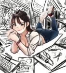  1girl ass azelweien bed breasts brown_eyes brown_hair computer cup dated_commentary desk drawing highres indoors long_hair looking_at_viewer lying medium_breasts monitor notebook on_stomach original pants paper partially_colored shirt sketch smile solo the_pose traditional_media white_shirt writing 