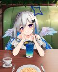  1girl absurdres amane_kanata angel angel_wings bare_shoulders blue_hair booth_seating casual coffee coffee_cup collarbone colored_inner_hair cup disposable_cup drinking_glass drinking_straw feathered_wings food fork grey_hair hair_ornament hairclip halo highres hololive knife long_hair looking_at_viewer multicolored_hair pasta plate smile solo sty table violet_eyes virtual_youtuber wings 
