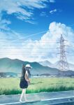  1girl absurdres arms_at_sides barefoot black_hair blue_sky brown_jacket building clouds commentary_request contrail cumulonimbus_cloud day feet field guitar_case highres hill instrument_case jacket kumagaya_nono landscape long_hair mountain original outdoors power_lines rice_paddy road rural scenery shirt sidewalk sky toes transmission_tower walking white_headwear white_shirt 