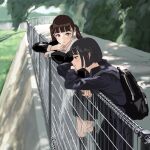  2girls backpack bag bangs black_dress black_eyes black_hair blunt_bangs blurry blurry_background bob_cut brown_hair crossed_arms dress fence head_rest highres hiramedousa looking_at_another looking_down multiple_girls nature original outdoors parted_lips school_uniform serafuku short_hair standing twintails 