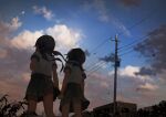  2girls absurdres black_hair black_sailor_collar building clouds cloudy_sky commentary_request dark from_behind from_below highres holding_hands inami_hatoko interlocked_fingers leaf letterboxed long_hair multiple_girls original plant pleated_skirt power_lines sailor_collar scenery school_uniform serafuku shirt short_hair short_sleeves skirt sky twintails utility_pole white_shirt wind 