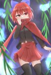  1girl absurdres bangs black_legwear black_shirt blue_bow blurry blurry_background bow cape cloak covered_mouth dakuazu eyebrows_visible_through_hair hair_bow highres looking_at_viewer navel outdoors plant red_cape red_eyes red_skirt redhead sekibanki shirt short_hair skirt solo thigh-highs touhou zettai_ryouiki 