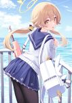  1girl assault_rifle bag bangs blue_archive blue_sailor_collar bullpup clouds day deadnooodles gun halo hifumi_(blue_archive) highres horizon l85 leaning_forward light_brown_hair long_hair long_sleeves looking_at_viewer looking_back low_twintails ocean open_mouth pantyhose pleated_skirt railing rifle sailor_collar shirt skirt sky sling solo standing twintails weapon yellow_eyes 