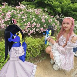  2girls alternate_costume black_hair blue_skin blunt_bangs blunt_ends character_doll colored_skin doll dress ena_(ena) ena_(series) ena_(species) ena_(web_series) happy_ena highres multicolored_skin multiple_girls photo_background real_life_insert sad_ena short_sleeves split-color_skin two-tone_skin usagimarumei yellow_skin 