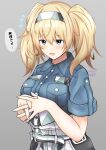  1girl abataa absurdres blonde_hair blue_eyes blue_shirt breast_pocket breasts collared_shirt gambier_bay_(kancolle) hairband highres kantai_collection large_breasts multicolored_hairband pocket shirt short_sleeves solo speech_bubble translation_request twintails 