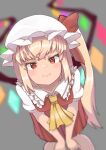  1girl absurdres ascot bangs blonde_hair blurry blurry_background blurry_foreground blush crystal depth_of_field eyebrows_behind_hair eyebrows_visible_through_hair flandre_scarlet foreshortening frilled_shirt_collar frills from_above grey_background hat hat_ribbon highres leaning_forward long_hair miniskirt mob_cap onbashria one_side_up pov puffy_short_sleeves puffy_sleeves red_eyes red_ribbon red_skirt red_vest ribbon shirt short_sleeves simple_background skirt skirt_set smile solo touhou vest white_headwear white_shirt wings 