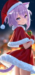  1girl absurdres ahoge animal_ears blurry blurry_background capelet cat_ears cat_girl cat_tail closed_mouth commentary crossed_bangs double-parted_bangs dress earrings from_side fur-trimmed_capelet fur-trimmed_dress fur-trimmed_gloves fur-trimmed_headwear fur_trim gift gloves hair_between_eyes hat highres holding holding_gift hololive jewelry looking_at_viewer maverick_(mvk022) nekomata_okayu night outdoors pom_pom_(clothes) purple_hair red_capelet red_dress red_gloves red_hat santa_costume santa_dress santa_hat short_hair smile solo standing tail tail_under_clothes two_side_up violet_eyes virtual_youtuber 