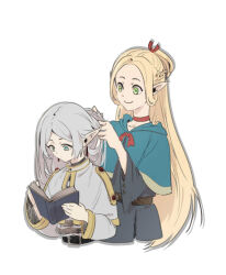  2girls blonde_hair blue_eyes book capelet crossover dsprite23 dungeon_meshi elf frieren green_capelet highres holding holding_book long_hair looking_at_object marcille_donato multiple_girls pointy_ears reading sousou_no_frieren tying_hair very_long_hair white_background white_capelet white_hair 