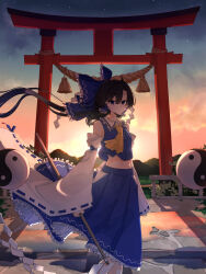  1girl absurdres alternate_color ascot blue_bow blue_skirt bow brown_hair closed_mouth clouds commentary_request detached_sleeves evening frilled_bow frilled_hair_tubes frilled_skirt frills gohei hair_bow hair_tubes hakurei_reimu highres holding holding_gohei long_hair looking_at_viewer orb outdoors player_2 puddle ribbon-trimmed_sleeves ribbon_trim shirataki_oden2 skirt skirt_set solo star_(sky) sun torii touhou yellow_ascot yin_yang yin_yang_orb 