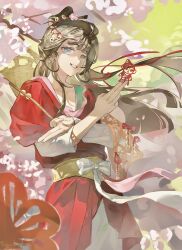  1girl absurdres between_fingers black_hair blue_eyes chinese_clothes chinese_paper-cut facial_mark floating_hair flower forehead_mark green_background grin hair_branch hair_bun hands_up hanfu hat_on_back highres holding holding_paper layered_sleeves long_hair long_sleeves paper paper_heron papercutting pink_flower red_hanfu reverse:1999 short_over_long_sleeves short_sleeves smile solo upper_body weimao wu_fuzuoyong 