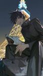  1boy black_eyes black_hair black_jacket black_pants fushiguro_megumi hair_behind_ear highres jacket jujutsu_kaisen jujutsu_tech_uniform k00s looking_at_viewer looking_down male_focus night night_sky open_mouth pants sharp_teeth sitting sky solo teeth tokyo_tower tongue wolf yellow_eyes 