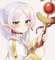  1girl blush capelet commentary_request earrings elf frieren from_side green_eyes grey_hair hands_up holding holding_staff jewelry kiranira long_hair long_sleeves looking_at_viewer parted_bangs parted_lips piercing pointy_ears short_eyebrows simple_background solo sousou_no_frieren staff teardrop_earrings turning_head twintails white_background white_capelet 