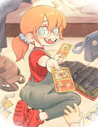 1girl absurdres aged_down backpack bag bed binder blue_eyes card child colo_(nagrolaz) commentary crocs english_commentary glasses handbag highres holding holding_card medium_hair orange_hair overalls pokemon pokemon_card ponytail pov red-framed_eyewear red_shirt rita_(sweethex) seiza shirt sidelocks sitting sweethex tooth_gap 