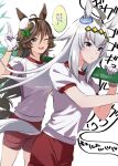  2girls ahoge animal_ears bamboo bangs blue_eyes blush breasts brown_hair carrying_over_shoulder closed_mouth crown gloves green_eyes grey_hair gym_uniform hair_ornament hairclip hat horse_ears horse_girl horse_tail long_sleeves looking_at_viewer mini_hat mini_top_hat misu_kasumi mr._c.b._(umamusume) multiple_girls oguri_cap_(umamusume) one_eye_closed open_mouth red_shorts salute shirt short_sleeves shorts small_breasts smile speech_bubble tail top_hat translation_request two-finger_salute umamusume white_background white_gloves white_shirt 