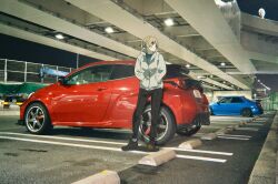  1girl absurdres black_pants black_shoes blonde_hair blue_car blue_shirt car commentary_request crane_(machine) crane_truck hands_in_pockets highres hood hooded_jacket jacket looking_to_the_side motor_vehicle original outdoors overpass pants parking_lot photo_background ponytail red_car shirt shoes short_hair solo soutou_nagi standing truck vehicle_request white_jacket 