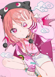  1girl beanie belt between_legs black_choker black_hat braid buttons choker clothes_writing cloud_print commentary_request cross-laced_shoes crossed_legs cursor dot_nose dragon_print hand_between_legs hand_up hat heart heart-shaped_pupils heart_choker highres jacket knees long_hair long_sleeves looking_at_viewer multicolored_belt ok_sign ok_sign_over_eye omutatsu open_clothes open_jacket orange_hair orange_shoes original parted_lips pink_background pink_belt pink_eyes pink_shirt pink_sleeves pink_wings pom_pom_(clothes) pom_pom_beanie saliva saliva_trail shirt shoes shorts simple_background sitting symbol-shaped_pupils teeth twin_braids unbuttoned white_shorts wings 