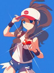  1girl baseball_cap black_vest blue_background blue_eyes breasts brown_hair closed_mouth cutoffs denim denim_shorts exposed_pocket hat high_ponytail highres hilda_(pokemon) holding holding_poke_ball long_hair looking_at_viewer mikakami1e open_clothes open_vest poke_ball poke_ball_(basic) poke_ball_print pokemon pokemon_black_and_white ponytail shirt short_shorts shorts sidelocks simple_background solo vest white_shirt wristband 