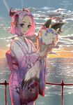  1girl 4kkc absurdres blue_eyes bouquet english_commentary eyeshadow flower from_side happy_valentine highres holding holding_bouquet japanese_clothes kimono looking_at_viewer makeup obi ocean original pink_eyeshadow pink_kimono purple_hair sash smile solo sunrise white_flower 