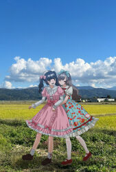  2girls black_hair blue_bow blue_dress blunt_bangs blush bow brown_hair brown_shoes cherry closed_eyes closed_mouth collared_dress commentary_request dress dress_bow food frilled_dress frilled_sleeves frills fruit full_body hair_bow hairband highres hug hug_from_behind loafers lolita_fashion lolita_hairband long_hair looking_at_another mary_janes multiple_girls open_mouth original photo_background pink_bow pink_dress platform_shoes print_dress puffy_short_sleeves puffy_sleeves red_shoes rounded_collar rural shirt shoes short_sleeves smile socks standing strawberry sweet_lolita tear_troughs tsuzuki_amy twintails white_shirt white_socks yuri 