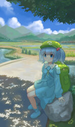  1girl absurdres backpack bag blue_boots blue_eyes blue_hair blue_shirt blue_skirt blue_sky boots breasts closed_mouth clouds commentary_request day flat_cap green_bag green_hat hair_bobbles hair_ornament hat highres jewelry kawashiro_nitori key key_necklace long_sleeves looking_at_viewer medium_hair mountainous_horizon necklace outdoors rice_paddy rubber_boots shadow shirt sitting skirt sky small_breasts smile solo toorooo touhou two_side_up 
