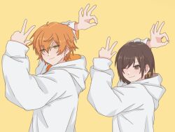 1boy 1girl arm_up blonde_streaks brother_and_sister brown_eyes brown_hair closed_mouth commentary earrings goodbye_sengen_(vocaloid) green_eyes hair_between_eyes hair_over_one_eye hand_up hood hood_down hoodie jewelry long_sleeves looking_at_viewer multicolored_hair ok_sign one_eye_closed orange_hair parody project_sekai shinonome_akito shinonome_ena short_hair siblings sidelocks simple_background smile streaked_hair thysimpnar upper_body w white_hoodie yellow_background 