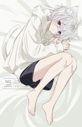  1boy ahoge animal_ears black_shorts blue_eyes blush cat_ears cat_tail highres hood hood_down hooded_jacket hoodie jacket kawashimo long_sleeves looking_at_viewer lying male_focus on_bed open_mouth original parted_lips short_shorts shorts tail white_hair white_hoodie 