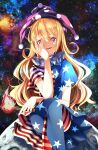  1girl american_flag_dress american_flag_pants bangs black_sky blonde_hair clownpiece commentary_request crossed_legs dress fire hair_between_eyes hand_on_own_face hand_up hat highres holding holding_torch jester_cap long_hair looking_at_viewer moon neck_ruff night night_sky open_mouth pants pink_eyes pink_headwear polka_dot short_sleeves sitting sky smile solo space star_(sky) star_(symbol) star_print starry_sky striped striped_dress striped_pants torch touhou wakadori1234 