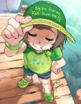  1girl baseball_cap brown_hair child closed_eyes closed_mouth foreshortening freckles from_above full_body girutea green_shirt hat highres indie_virtual_youtuber lily_hopkins meme mouth_hold print_shirt shirt short_hair short_sleeves shorts signature slippers smile solo split_mouth stalk_in_mouth standing sweat virtual_youtuber water women_want_me_fish_fear_me_(meme) wristband 