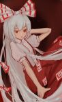  1girl absurdres bow collared_shirt commentary_request feet_out_of_frame fujiwara_no_mokou grey_hair hair_bow hand_on_own_head hand_on_own_leg highres knees_up long_hair looking_at_viewer open_mouth pants puffy_short_sleeves puffy_sleeves qian-li-xin-hen red_bow red_eyes red_pants shirt short_sleeves solo suspenders touhou two-tone_bow very_long_hair white_bow white_shirt 