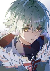  1boy alyosha_(genshin_impact) commentary earmuffs freckles fur-trimmed_hood fur_trim genshin_impact green_hair hair_between_eyes highres hood hood_down kuro015896 looking_at_viewer male_focus parted_lips simple_background solo upper_body white_background yellow_eyes 