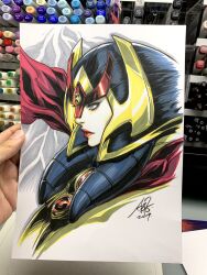  1girl big_barda black_helmet blue_eyes cape commentary dc_comics english_commentary from_side gold_helmet helmet highres marker_(medium) parted_lips photo_(medium) red_cape red_lips serious signature solo stanley_lau traditional_media 