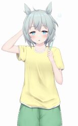  1girl animal_ears blue_eyes blush ceresia8327 commentary_request green_shorts grey_hair hair_between_eyes highres holding holding_toothbrush horse_ears horse_girl looking_at_viewer open_mouth seiun_sky_(umamusume) shirt short_hair short_sleeves shorts simple_background solo squeans toothbrush umamusume white_background yellow_shirt 