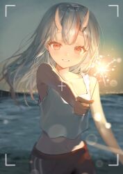  1girl alternate_costume alternate_hairstyle beach blurry blurry_background blush center-flap_bangs city_lights clear_sky collarbone commentary_request cowboy_shot cropped_shirt dim_lighting dot_nose dusk fireworks flat_chest floating_hair grey_hair grin hair_between_horns highres holding holding_fireworks hololive horns iruka3 lens_flare long_hair looking_at_viewer midriff multicolored_hair nakiri_ayame navel oni outdoors outstretched_arm red_eyes red_shorts red_streaks shirt shorts skin-covered_horns sky skyline sleeveless sleeveless_shirt smile solo sparkler streaked_hair tank_top two-tone_hair viewfinder virtual_youtuber water white_tank_top 