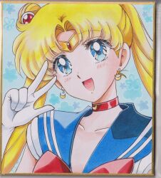  1girl :d bishoujo_senshi_sailor_moon blonde_hair blue_background blue_eyes blue_sailor_collar bow chikoto_(kztc4472) choker circlet collarbone commentary crescent crescent_choker crescent_earrings curtained_hair double_bun earrings floral_background gem gloves gold_circlet hair_bun hair_ornament hand_up highres jewelry leotard lone_nape_hair long_hair looking_at_viewer magical_girl open_mouth parted_bangs photo_(medium) picture_frame portrait red_bow red_choker red_gem sailor_collar sailor_moon sailor_senshi_uniform short_sleeves simple_background smile solo traditional_media tsukino_usagi twintails w white_gloves white_leotard 