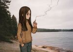  1girl bangs black_hair black_pants brown_eyes brown_sweater cigarette clouds cloudy_sky day denim emanon_(character) forest freckles grey_sky hand_in_pocket io_(onisarashi) jeans lake long_hair long_sleeves looking_away memories_of_emanon mouth_hold nature negative_space outdoors pants parted_bangs photo_(medium) photo_background sky smoke smoking solo standing sweater tree turtleneck 