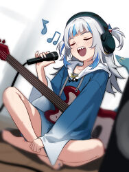  1girl amamiyayk bare_legs barefoot blue_hair blue_nails blurry blurry_background closed_eyes commentary fins fish_tail flipped_hair full_body gawr_gura gawr_gura_(1st_costume) grey_hair guitar hair_ornament headphones highres holding holding_microphone hololive hololive_english hood hood_down hoodie indian_style instrument long_sleeves medium_hair microphone multicolored_hair musical_note nail_polish open_mouth shark_tail sharp_teeth singing sitting solo streaked_hair tail teeth two_side_up upper_teeth_only virtual_youtuber wide_sleeves 