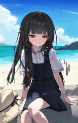  1girl aqoot beach black_dress black_hair blue_sky buttons chinese_commentary clouds collared_shirt commentary_request dress feet_out_of_frame hair_intakes hat highres light_frown long_hair looking_down on_rock original outdoors pinafore_dress red_eyes sand shirt short_sleeves sitting sky sleeveless sleeveless_dress smartwatch solo sun_hat unworn_hat unworn_headwear watch watch white_shirt 